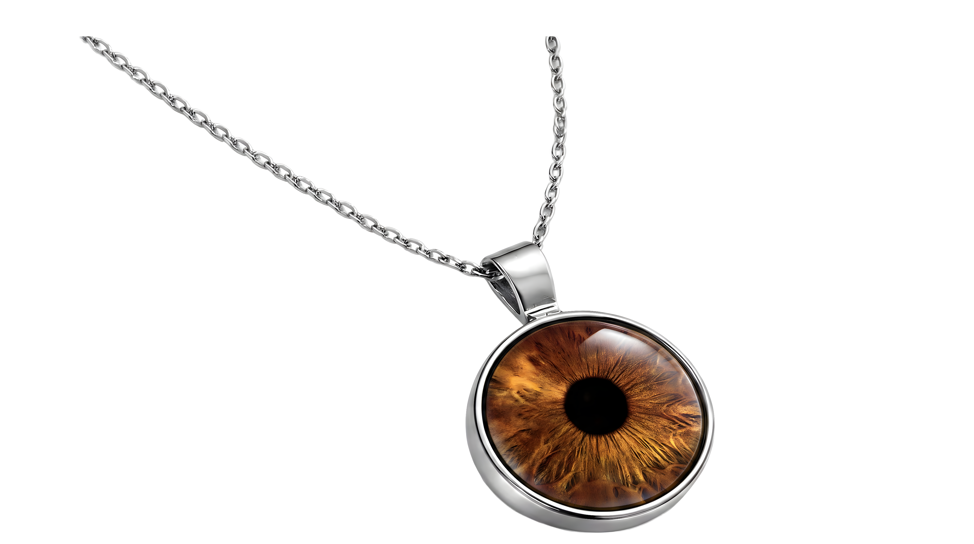 The Eyeris Signature necklace — a 1" round iris pendant featuring a custom amber-brown iris photograph set under a glass cabochon in a polished stainless steel bezel, hanging from a silver cable chain. Personalized iris photography jewelry by Eyeris Art Gallery.