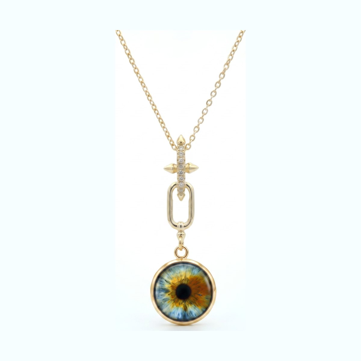 Eyeris Luxe necklace style G6 — custom iris pendant on a diamond-accented arrow drop bail in gold.
